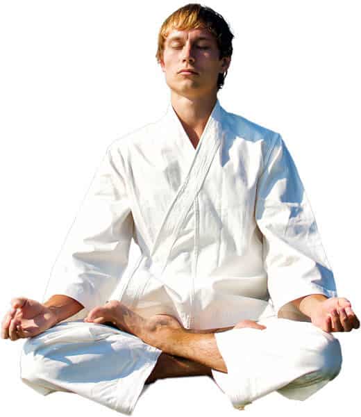 Martial Arts Lessons for Adults in Lemoyne PA - Young Man Thinking and Meditating in White