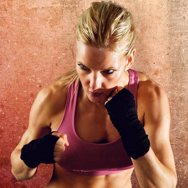 Mixed Martial Arts Lessons for Adults in Lemoyne PA - Lady Kickboxing Focused Background