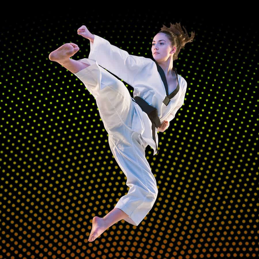 Martial Arts Lessons for Adults in Lemoyne PA - Girl Black Belt Jumping High Kick